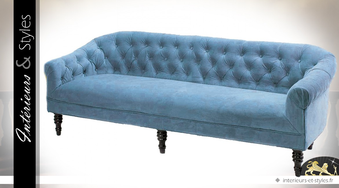 Canapé style rétro en tissu coloris bleu clair dossier capitonné