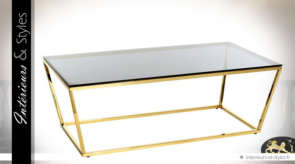 Table basse design dorée forme trapèze plateau verre fumé