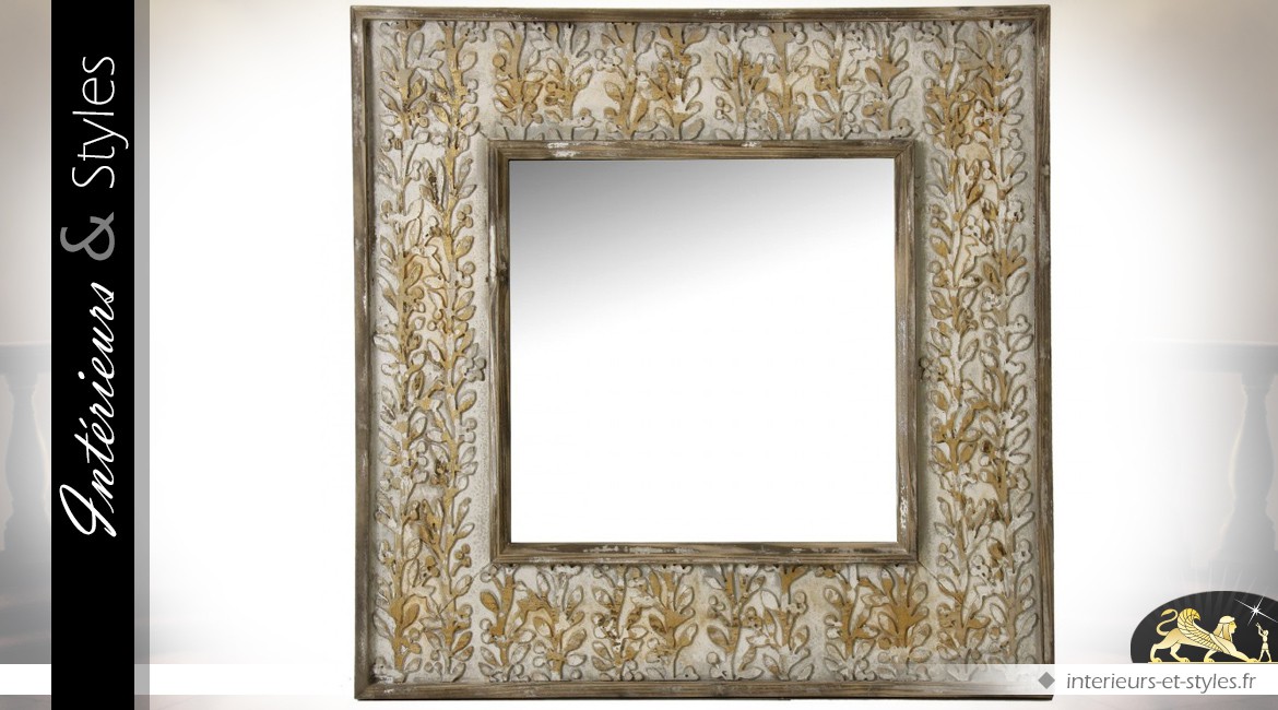 Miroir carré avec large encadrement à motifs feuillagés