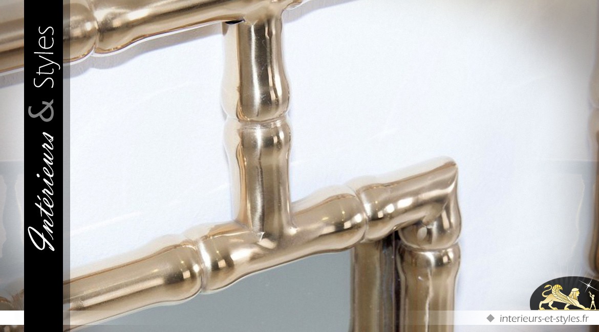 Miroir design à encadrement ajouré finition laiton doré ancien 90 cm
