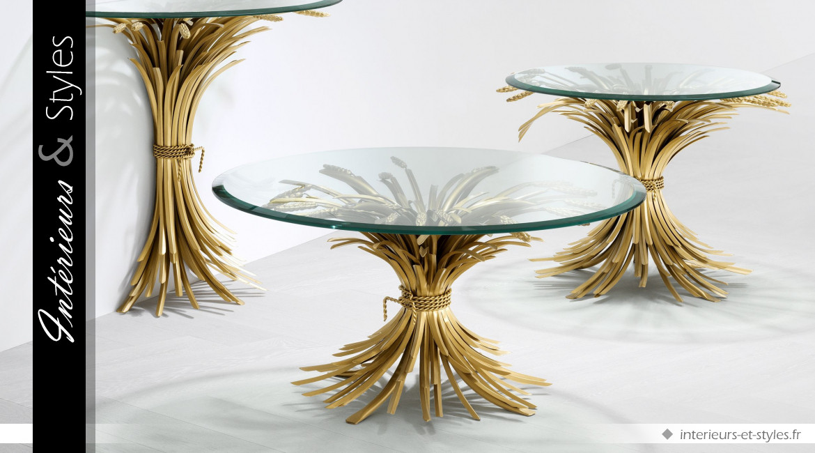 Table basse design Bonheur signée Eichholtz, base en épis métallique finition dorée et plateau en verre épais
